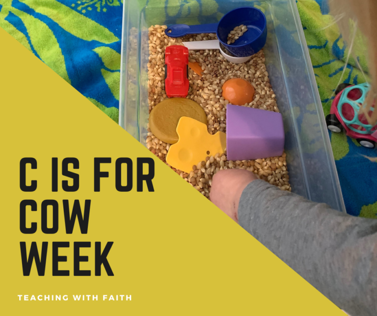 A little girl is playing in a tub with corn filled with toys that start with the letter C. The left side has a yellow triangle over the picture with the words "C is for Cow Week: Teaching with Faith" on it.