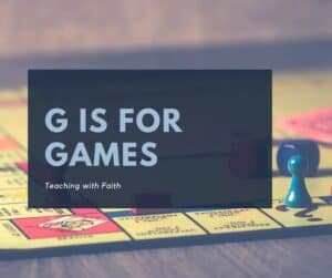 A background of Monopoly is seen with a box on top that says "G is for Games" referring to this post about the top 5 baord games for a preschool child.