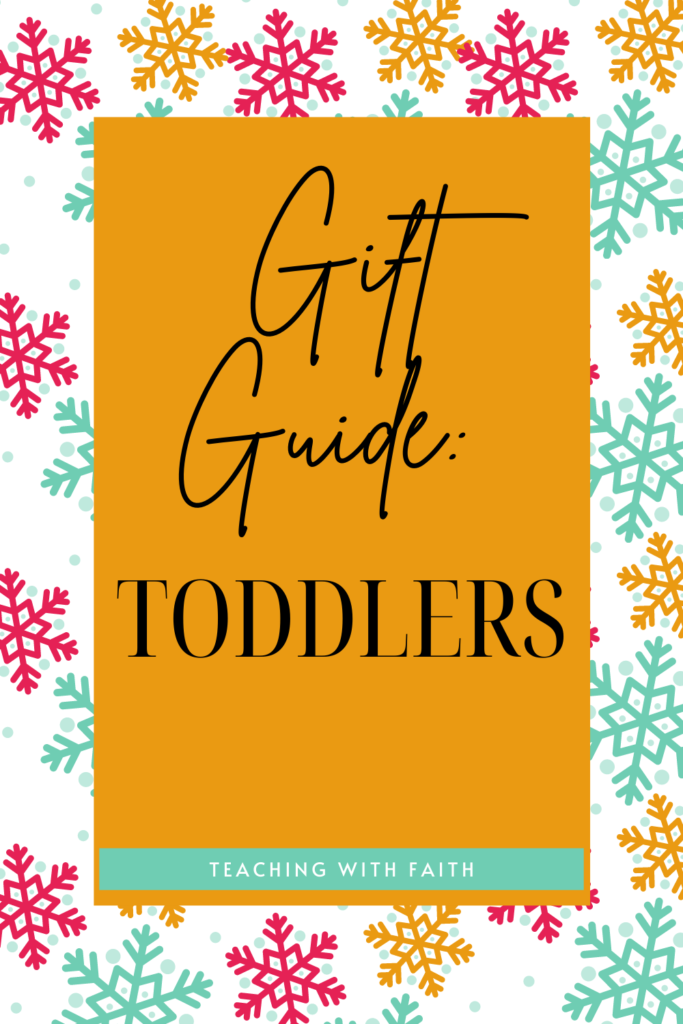 A large picture of a background of pink, blue, and gold snowflakes. There is a yellow rectangle in the middle that reads, "Gift guide: Toddlers."