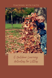 This image has a boy enjoying playing in the leaves. The title of the image is on the bottom of the boy playing. It reads, "6 Outdoor Learning Activities for Littles: Teaching with Faith."