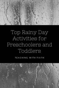 A black and white image of rain drops running down a window in the background.  There is a black box in the middle of the image that reads: "Top Rainy Day Activities for Preschoolers and Toddlers; Teaching with Faith."