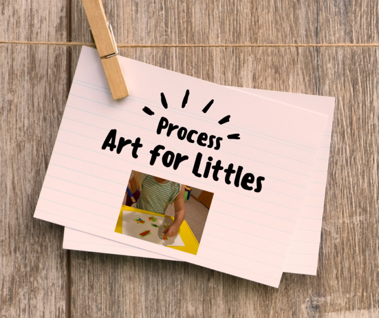 A wooden background has a paper hanging on a string with a clothespin on it. The piece of paper reads, "Process Art for Littles" and has a picture of a little girl doing a tissue paper collage.