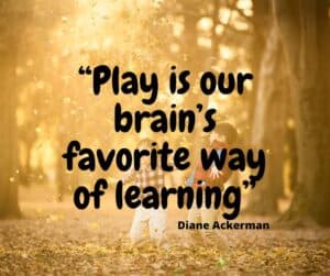 Two young children play in a forest with autumn leaves falling, overlaid with the quote: “Play is our brain’s favorite way of learning” — Diane Ackerman.